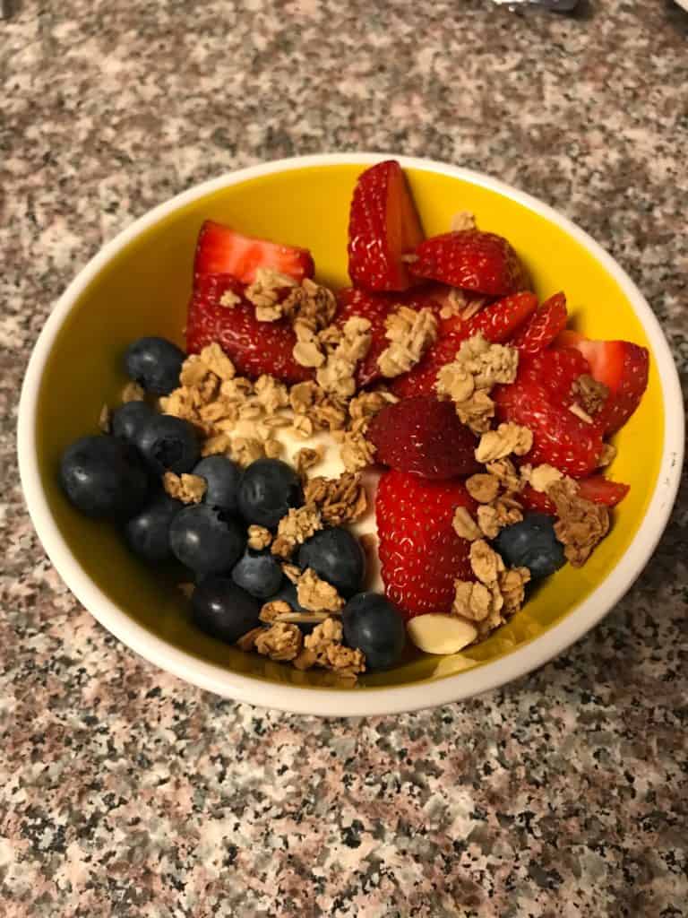 bowl of fruit with granola